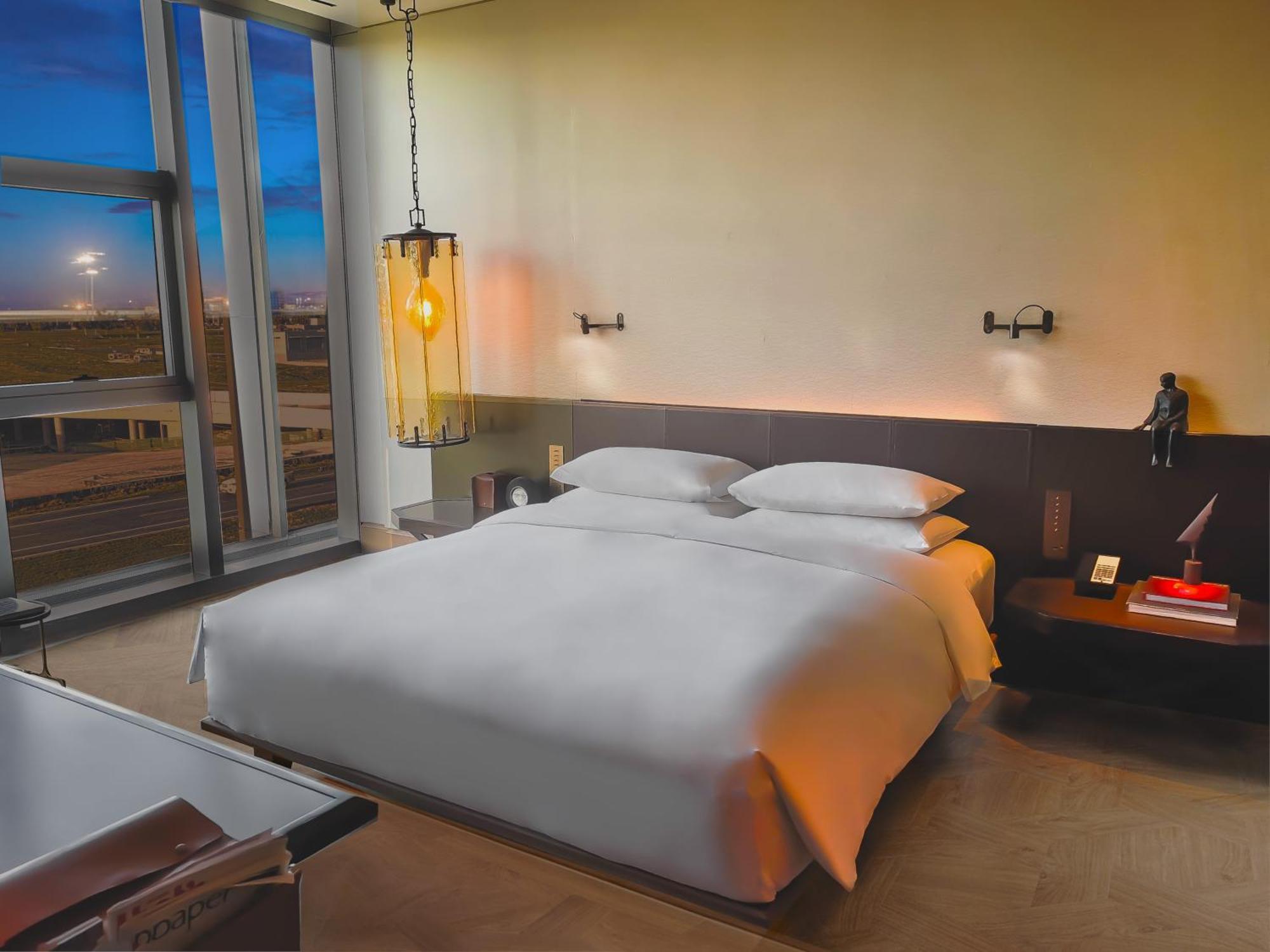 Hotel Mumian Beijing Daxing International Airport, Part Of Hyatt Zewnętrze zdjęcie A bedroom at the hotel